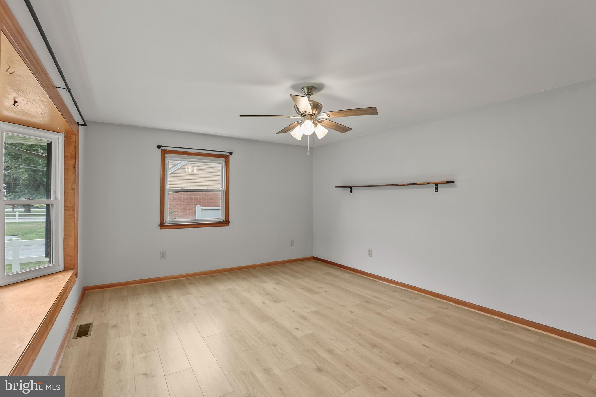 2152 White Hall Road Littlestown, PA 17340 - Photo 2 of 46 wooden floor in an empty room with a window