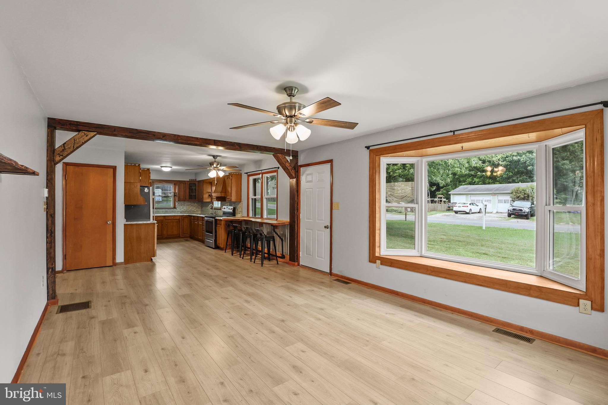 2152 White Hall Road Littlestown, PA 17340 - Photo 4 of 46 a view of an empty room with window and a kitchen
