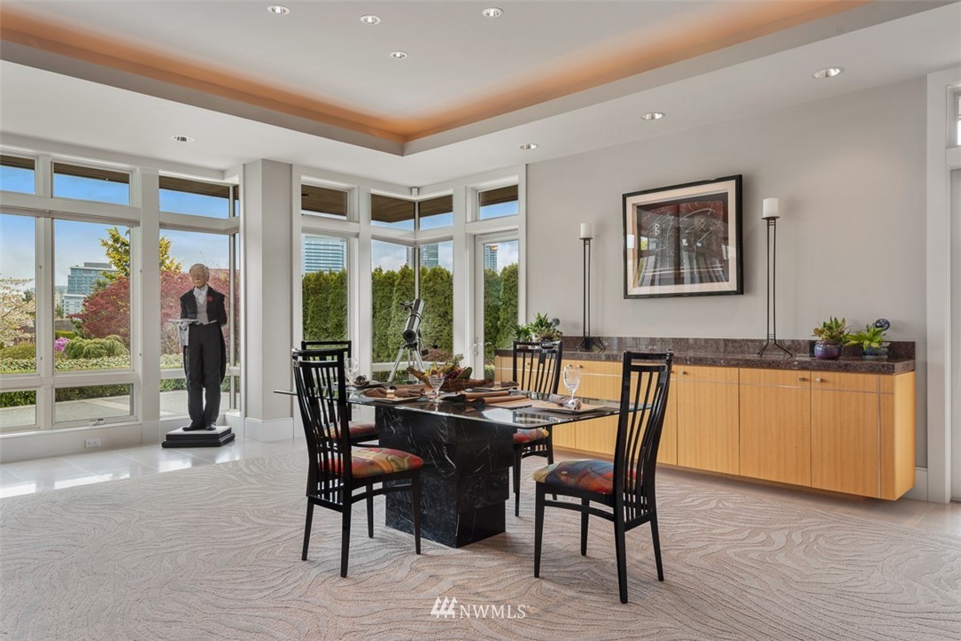 925 Park Road Bellevue, WA 98004 - Photo 12 of 25 a dining room with furniture and wooden floor