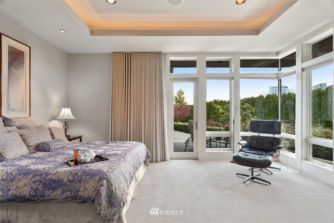 925 Park Road Bellevue, WA 98004 - Photo 13 of 25 a living room with furniture and large windows