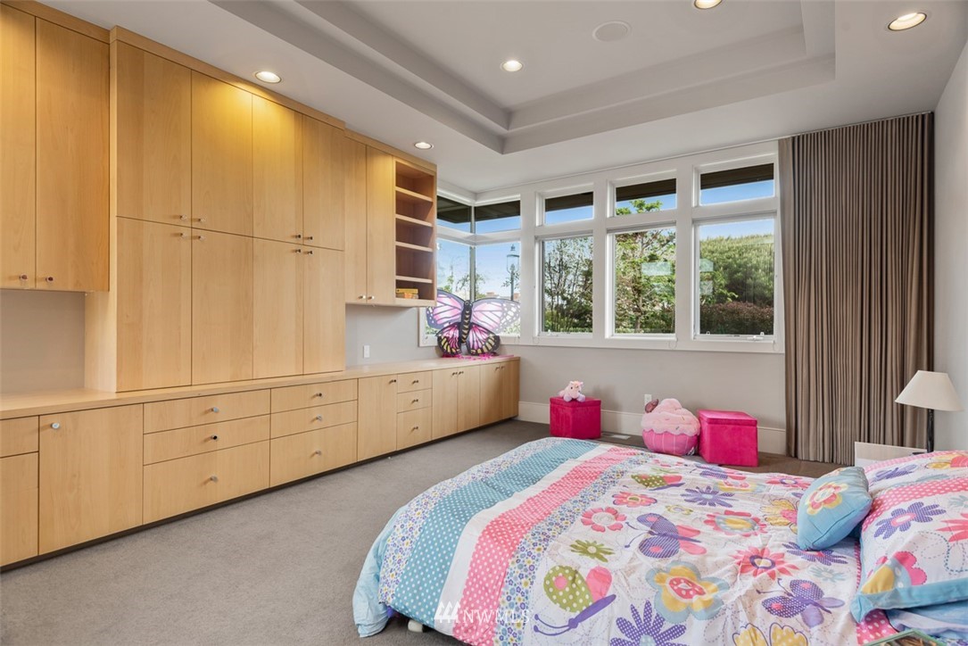 925 Park Road Bellevue, WA 98004 - Photo 16 of 25 a bedroom with a bed a window and dresser