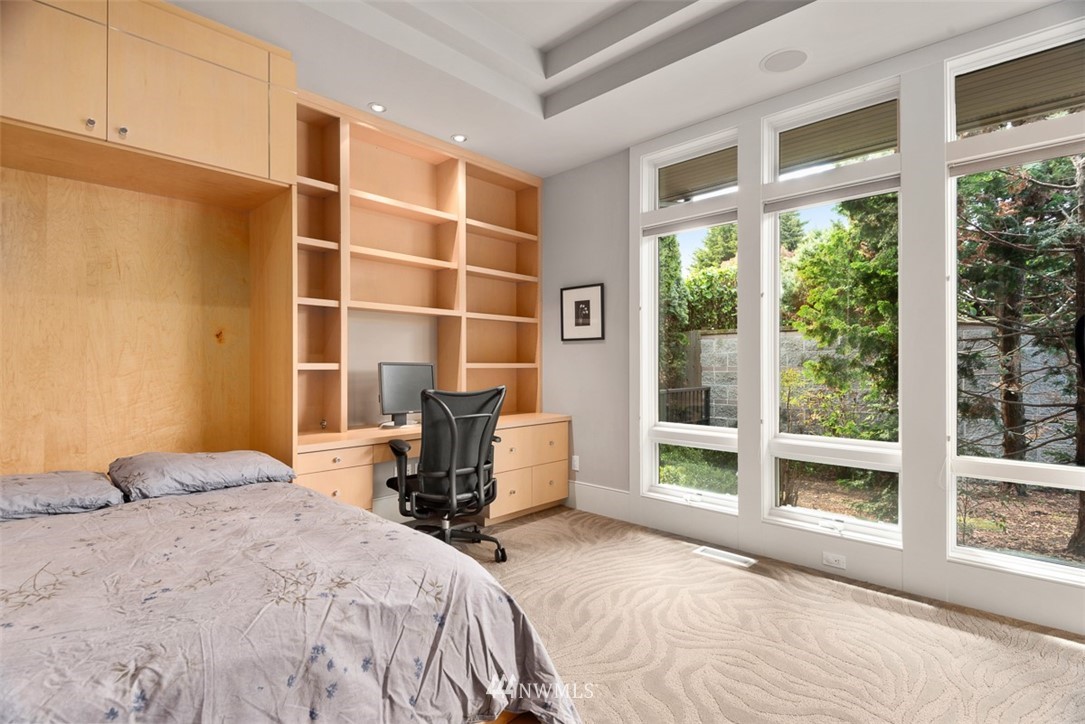 925 Park Road Bellevue, WA 98004 - Photo 21 of 25 a bedroom with a bed and a large window with the outer view