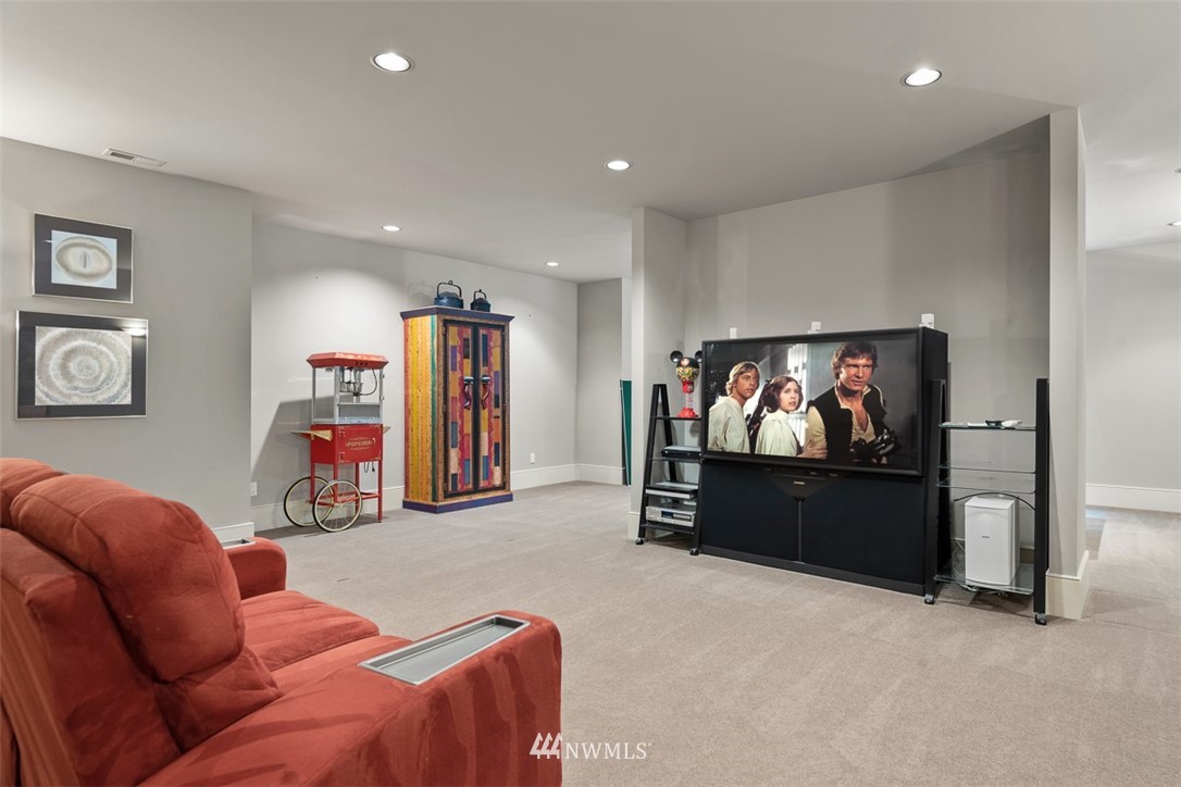 925 Park Road Bellevue, WA 98004 - Photo 23 of 25 a living room with furniture and a flat screen tv