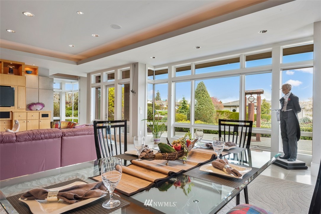 925 Park Road Bellevue, WA 98004 - Photo 7 of 25 a living room with furniture and floor to ceiling windows