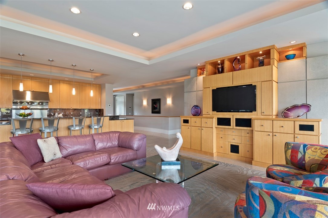 925 Park Road Bellevue, WA 98004 - Photo 8 of 25 a living room with furniture and a flat screen tv