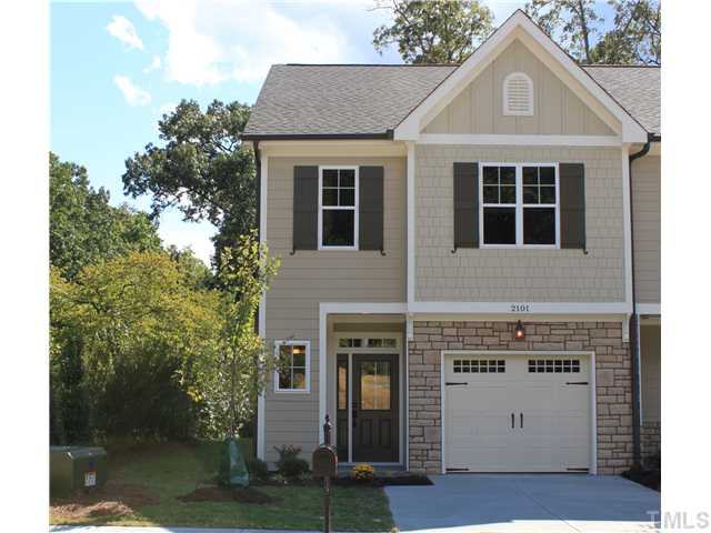 2101 Scarlet Maple Drive Raleigh, NC 27606 - Photo 1 of 18 a front view of a house with a yard