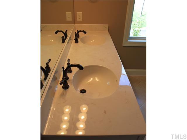 2101 Scarlet Maple Drive Raleigh, NC 27606 - Photo 12 of 18 a bathroom with a shower