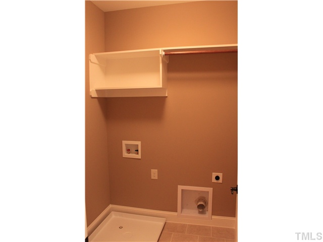 2101 Scarlet Maple Drive Raleigh, NC 27606 - Photo 15 of 18 a bathroom with a shower