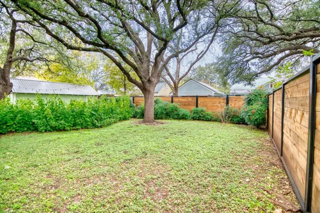 a view of a backyard with a garden