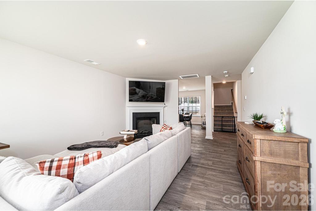1808 Bright Hope Lane Dallas, NC 28034 - Photo 11 of 44 a living room with furniture and a fireplace