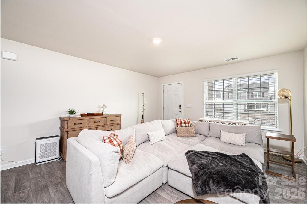 1808 Bright Hope Lane Dallas, NC 28034 - Photo 12 of 44 a living room with furniture and a fireplace