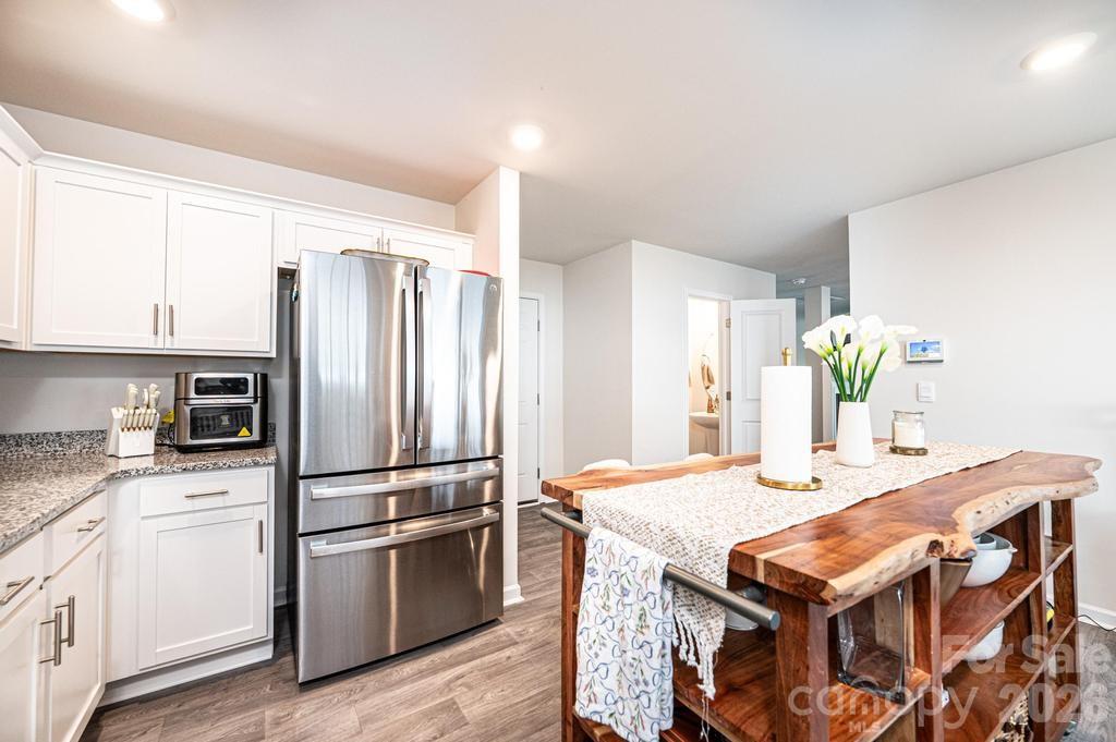 1808 Bright Hope Lane Dallas, NC 28034 - Photo 19 of 44 a kitchen with a refrigerator and a sink