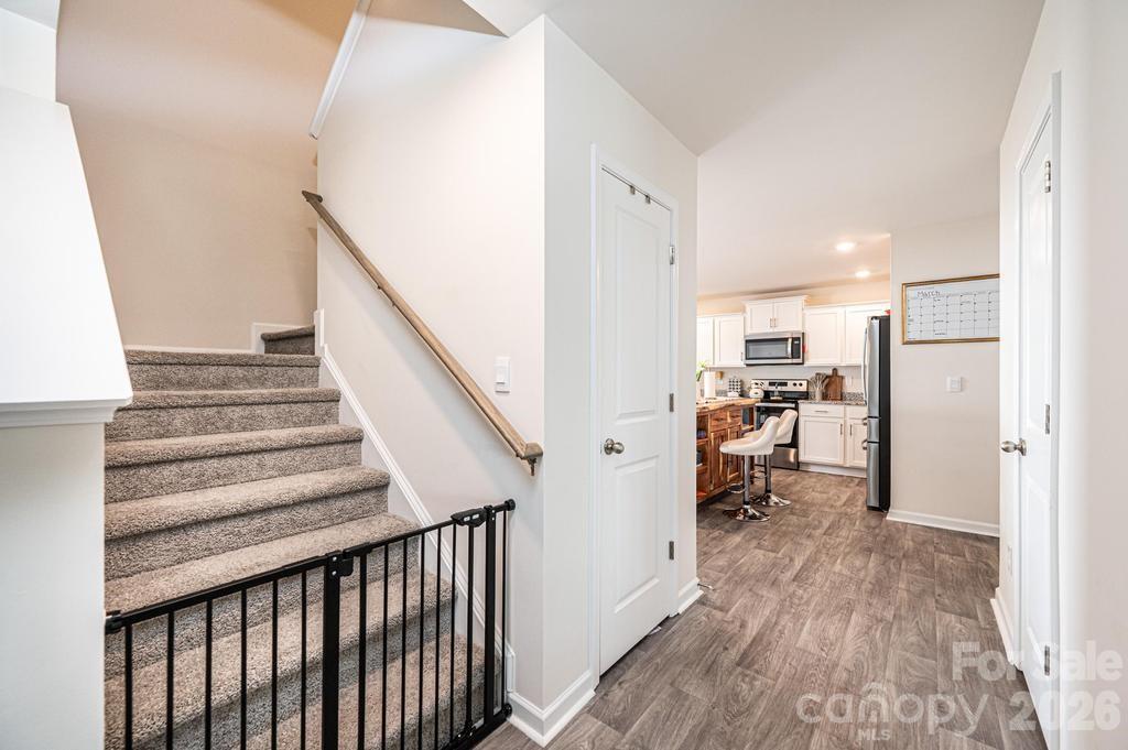 1808 Bright Hope Lane Dallas, NC 28034 - Photo 23 of 44 a view of a hallway view with wooden floor and staircase