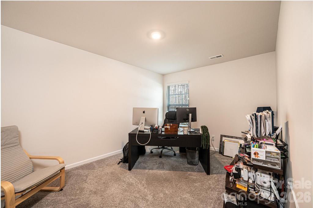 1808 Bright Hope Lane Dallas, NC 28034 - Photo 28 of 44 a room with furniture and a wooden floor