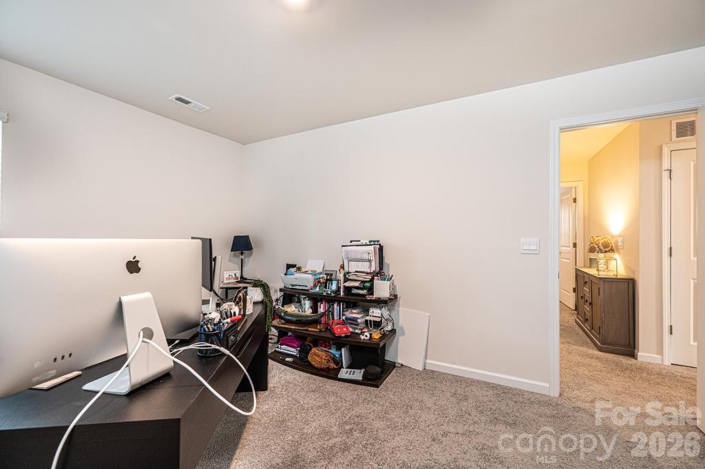 1808 Bright Hope Lane Dallas, NC 28034 - Photo 30 of 44 a view of a room with gym equipment
