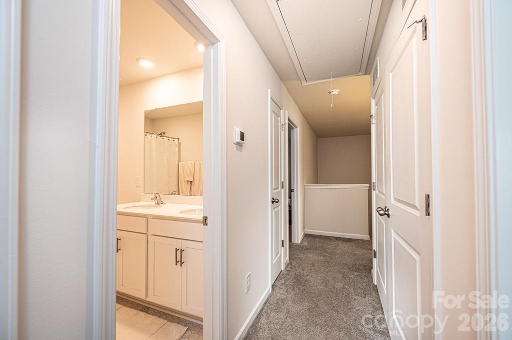1808 Bright Hope Lane Dallas, NC 28034 - Photo 31 of 44 view of a bathroom with a sink and mirror