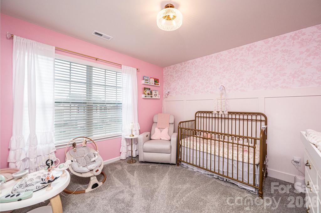 1808 Bright Hope Lane Dallas, NC 28034 - Photo 34 of 44 a bedroom with furniture and a window