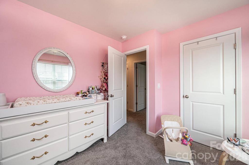 1808 Bright Hope Lane Dallas, NC 28034 - Photo 35 of 44 a bathroom with a mirror a sink and a mirror