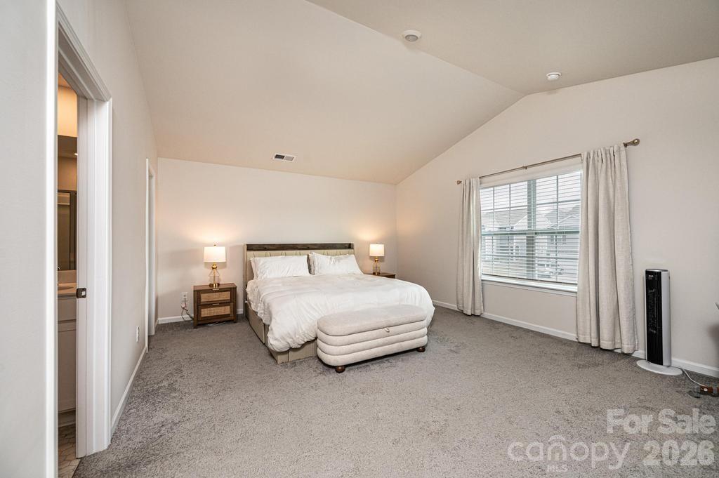 1808 Bright Hope Lane Dallas, NC 28034 - Photo 37 of 44 a bedroom with a bed and a window