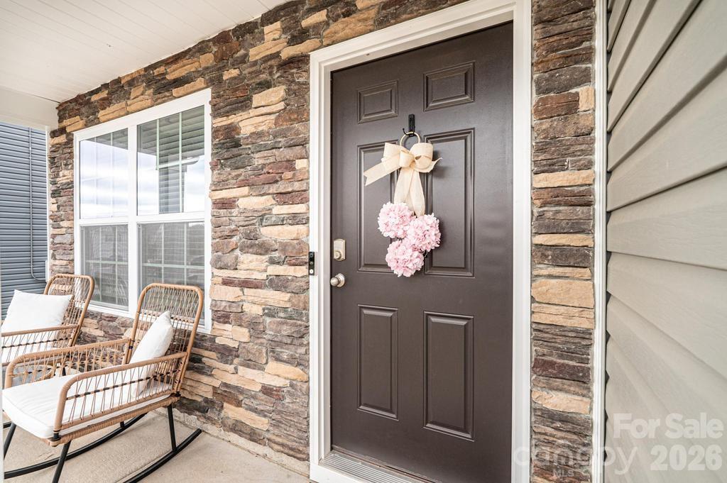 1808 Bright Hope Lane Dallas, NC 28034 - Photo 9 of 44 a front view of a house with wooden floor and a yard