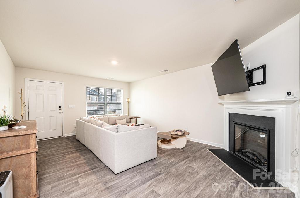 1808 Bright Hope Lane Dallas, NC 28034 - Photo 10 of 44 a living room with furniture and a fireplace
