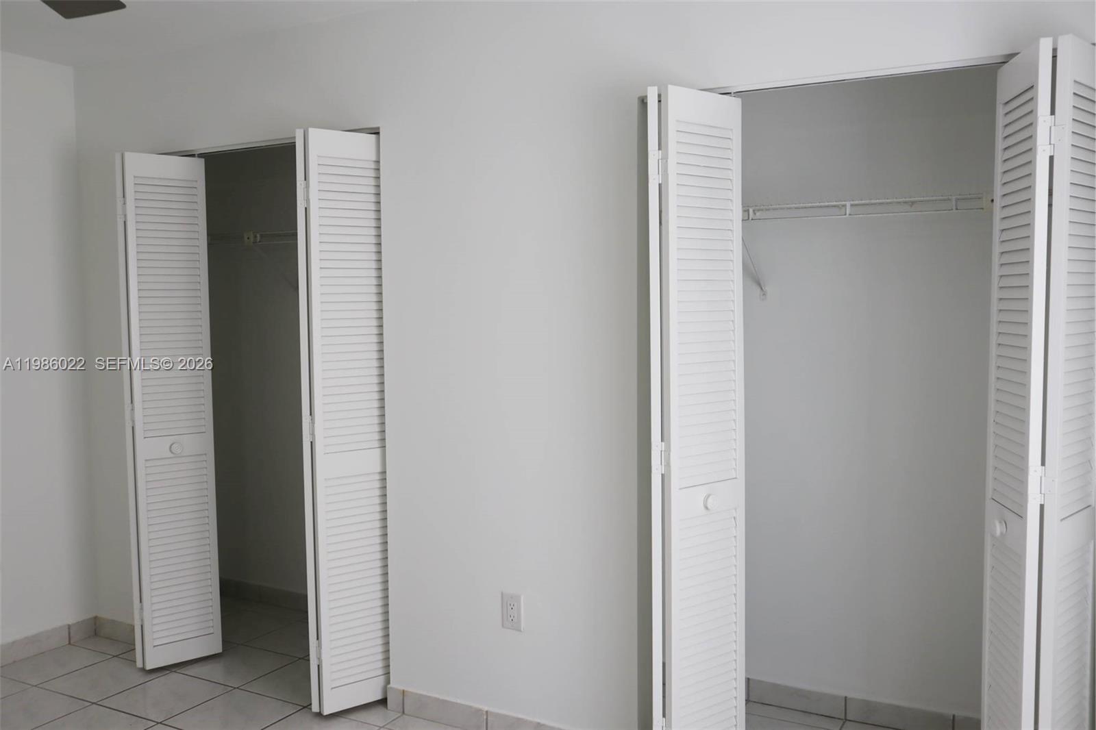 10101 West Okeechobee Road, Unit 12101 Hialeah Gardens, FL 33016 - Photo 8 of 12 a view of closet area