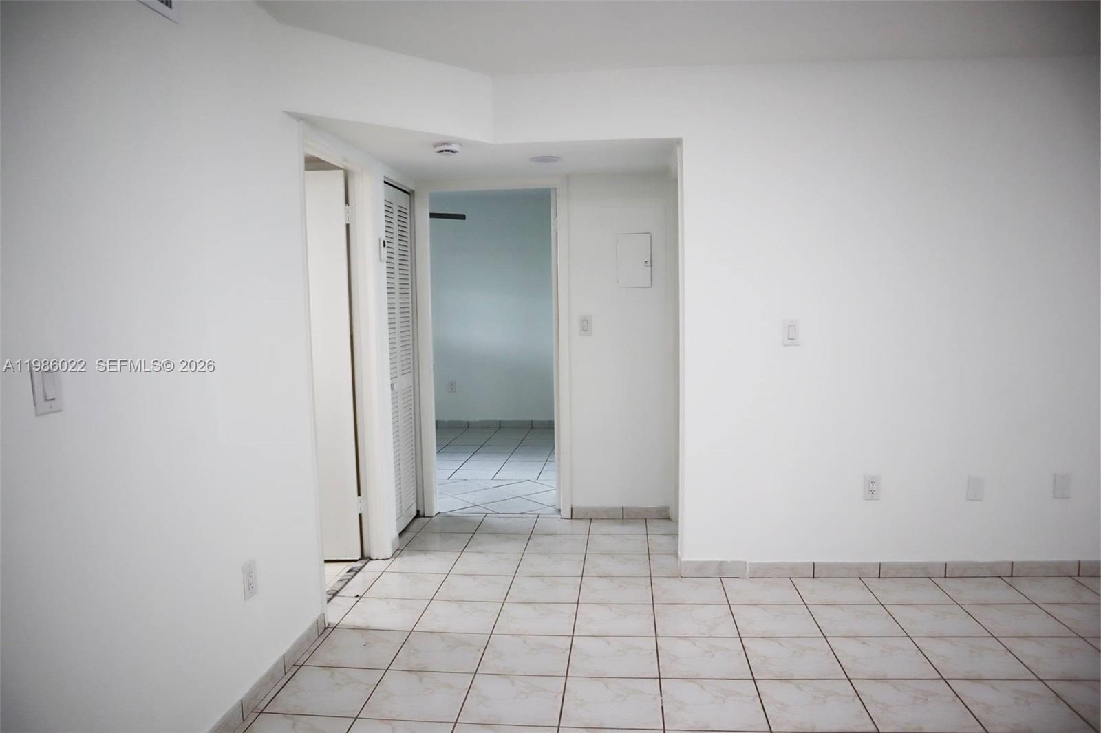 10101 West Okeechobee Road, Unit 12101 Hialeah Gardens, FL 33016 - Photo 9 of 12 a view of an empty room