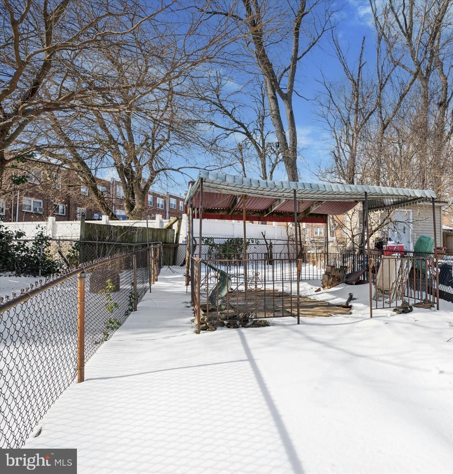 6320 Everett Street Philadelphia, PA 19149 - Photo 11 of 12 a view of a patio with a table and chairs under an umbrella