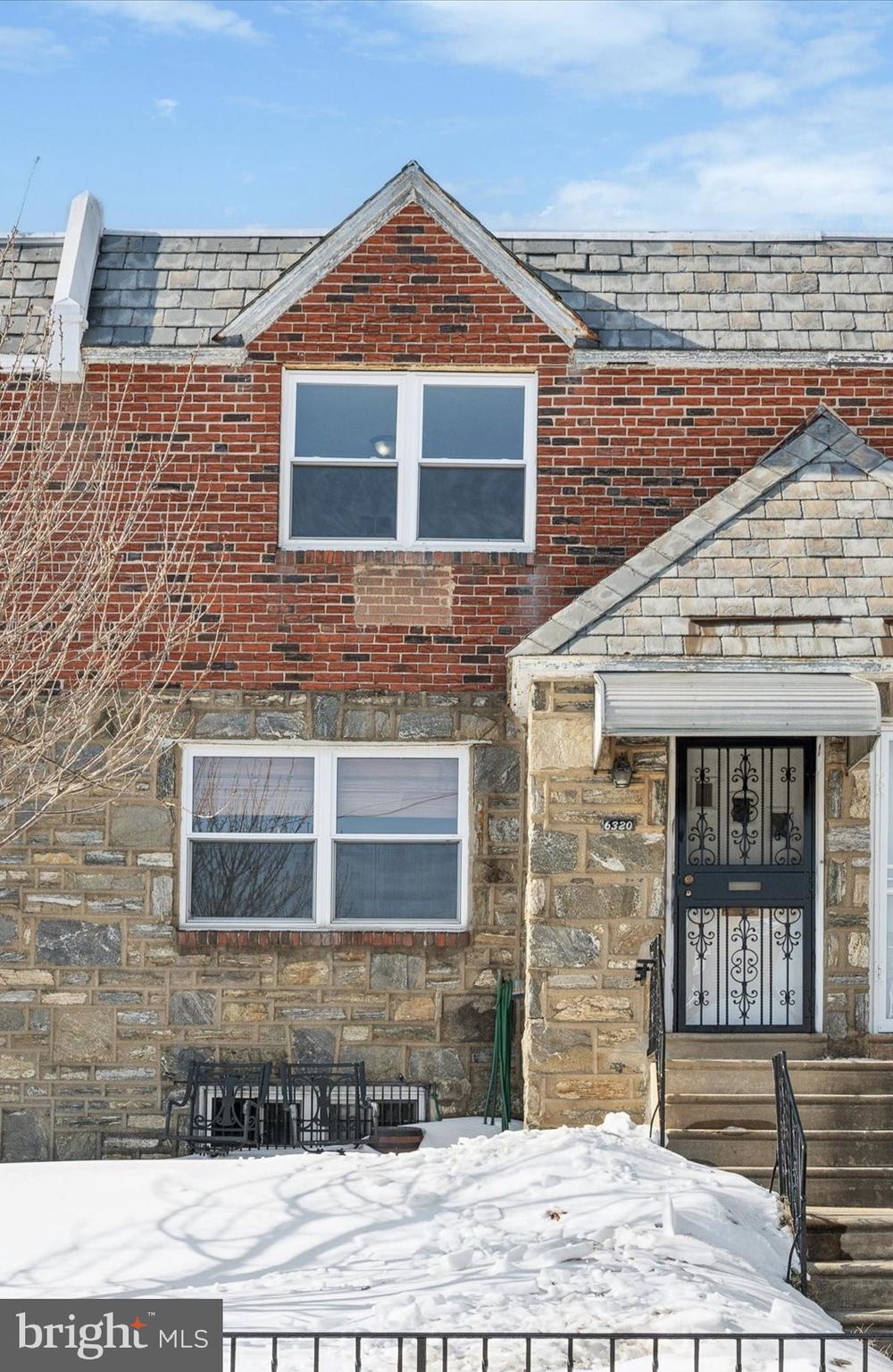 6320 Everett Street Philadelphia, PA 19149 - Photo 3 of 12 a front view of a house with a yard