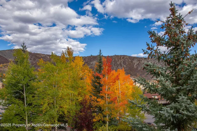 a view of swimming pool and outdoor seating
