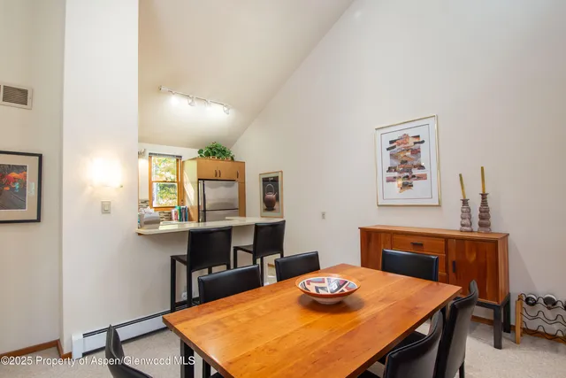 a view of a dining room with furniture