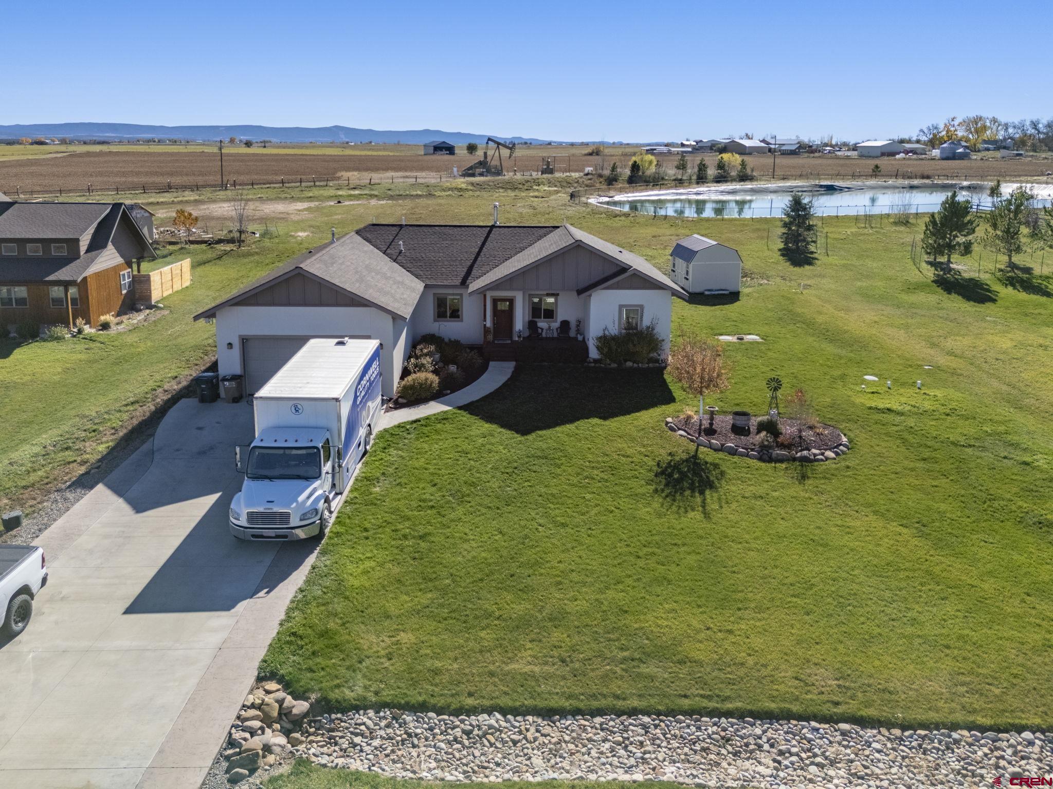 172 Encantado Lane Durango, CO 81303 - Photo 36 of 38 an aerial view of a house with a garden