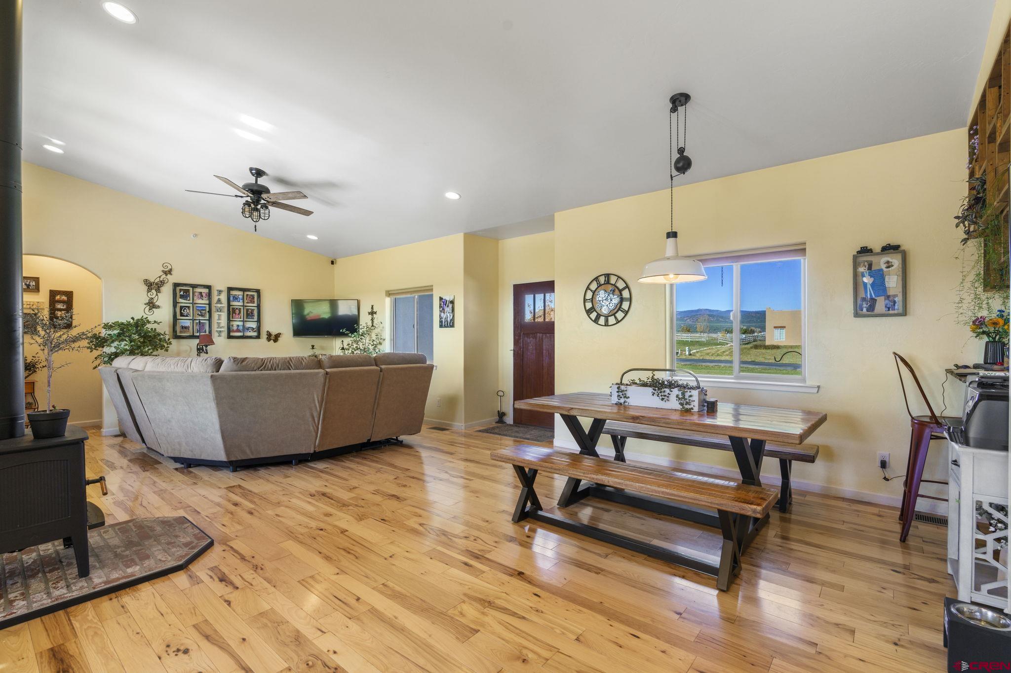 172 Encantado Lane Durango, CO 81303 - Photo 6 of 38 a living room with furniture and wooden floor