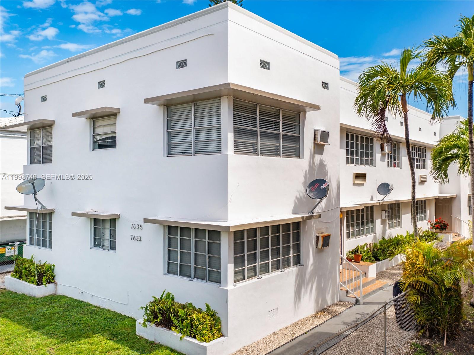 7635 Dickens Avenue, Unit 3 Miami Beach, FL 33141 - Photo 8 of 9 a front view of a building with a garden