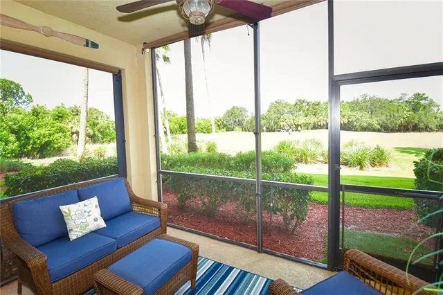 a living room with large windows