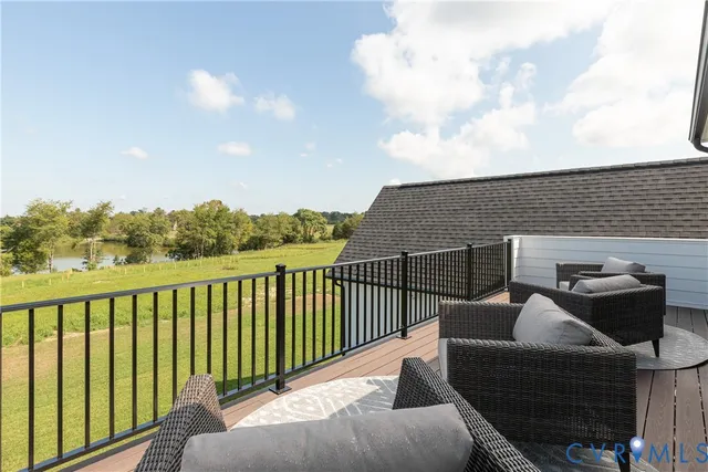 a balcony with furniture and city view