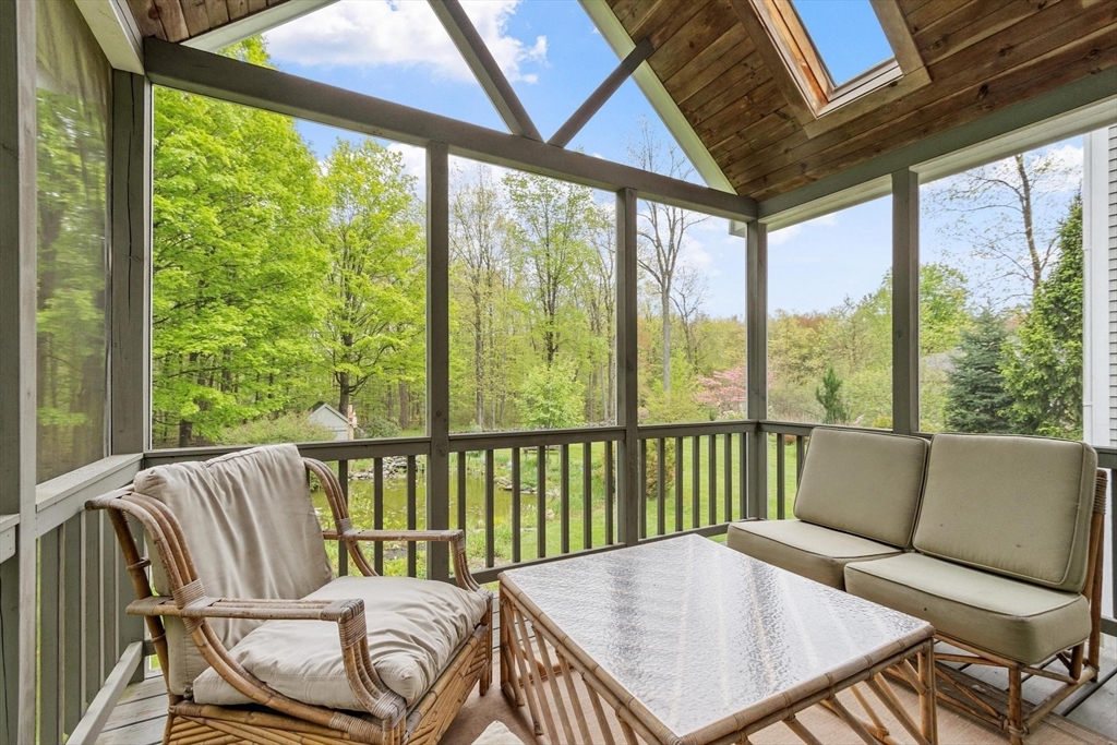 94 Turner Road Townsend, MA 01469 - Photo 20 of 42 a balcony view with a seating space