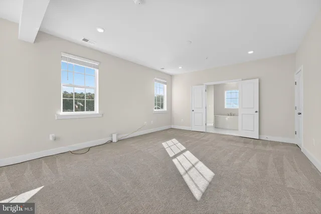 an empty room with windows