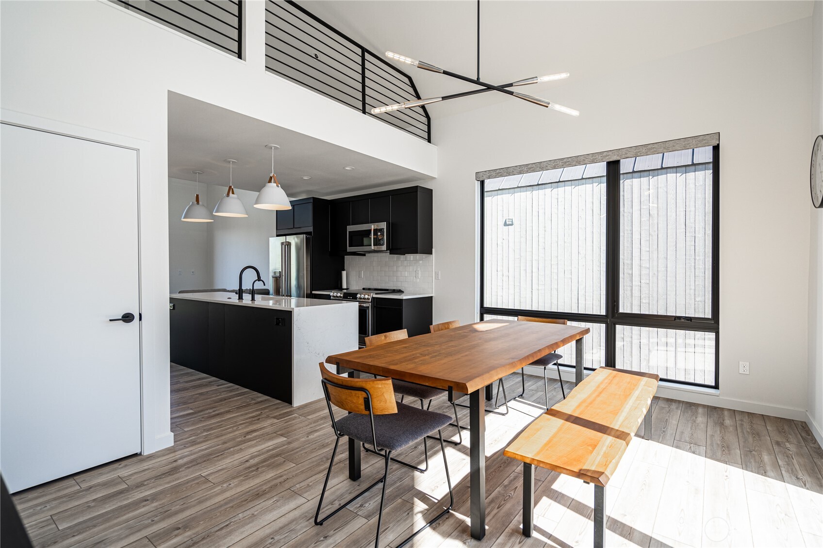 1418 Cottage Lane Chelan, WA 98816 - Photo 15 of 40 a kitchen with a table chairs and wooden floor
