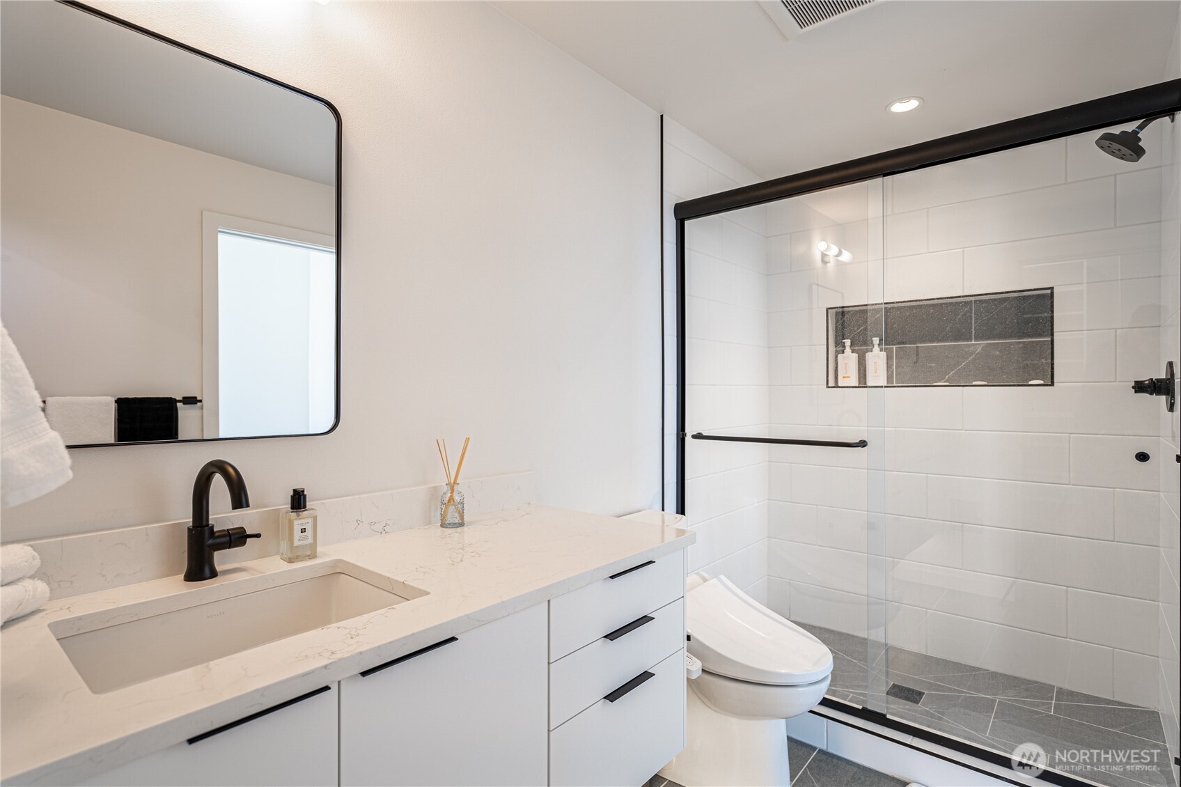 1418 Cottage Lane Chelan, WA 98816 - Photo 20 of 40 a bathroom with a sink toilet and shower