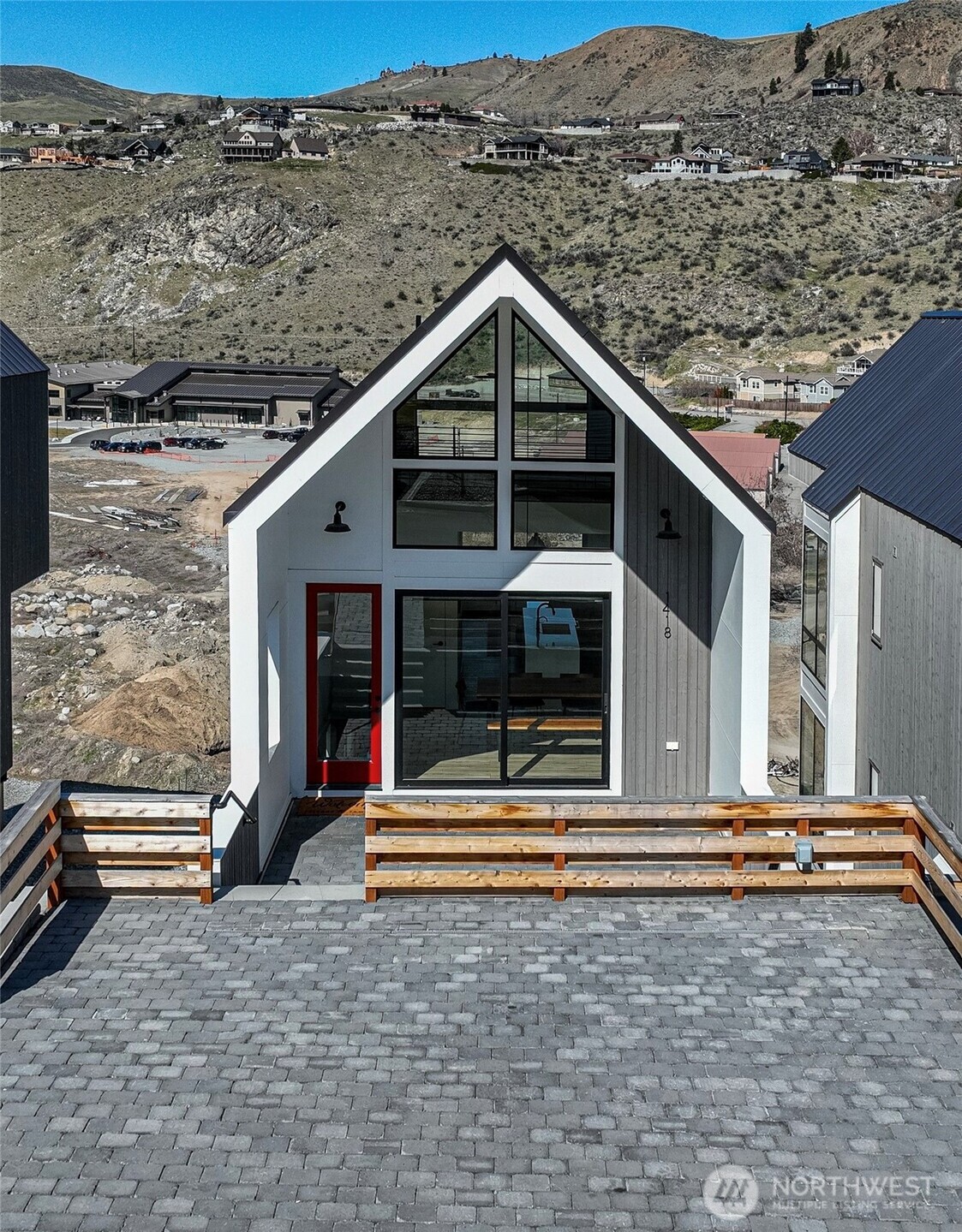 1418 Cottage Lane Chelan, WA 98816 - Photo 2 of 40 a front view of a house with a yard