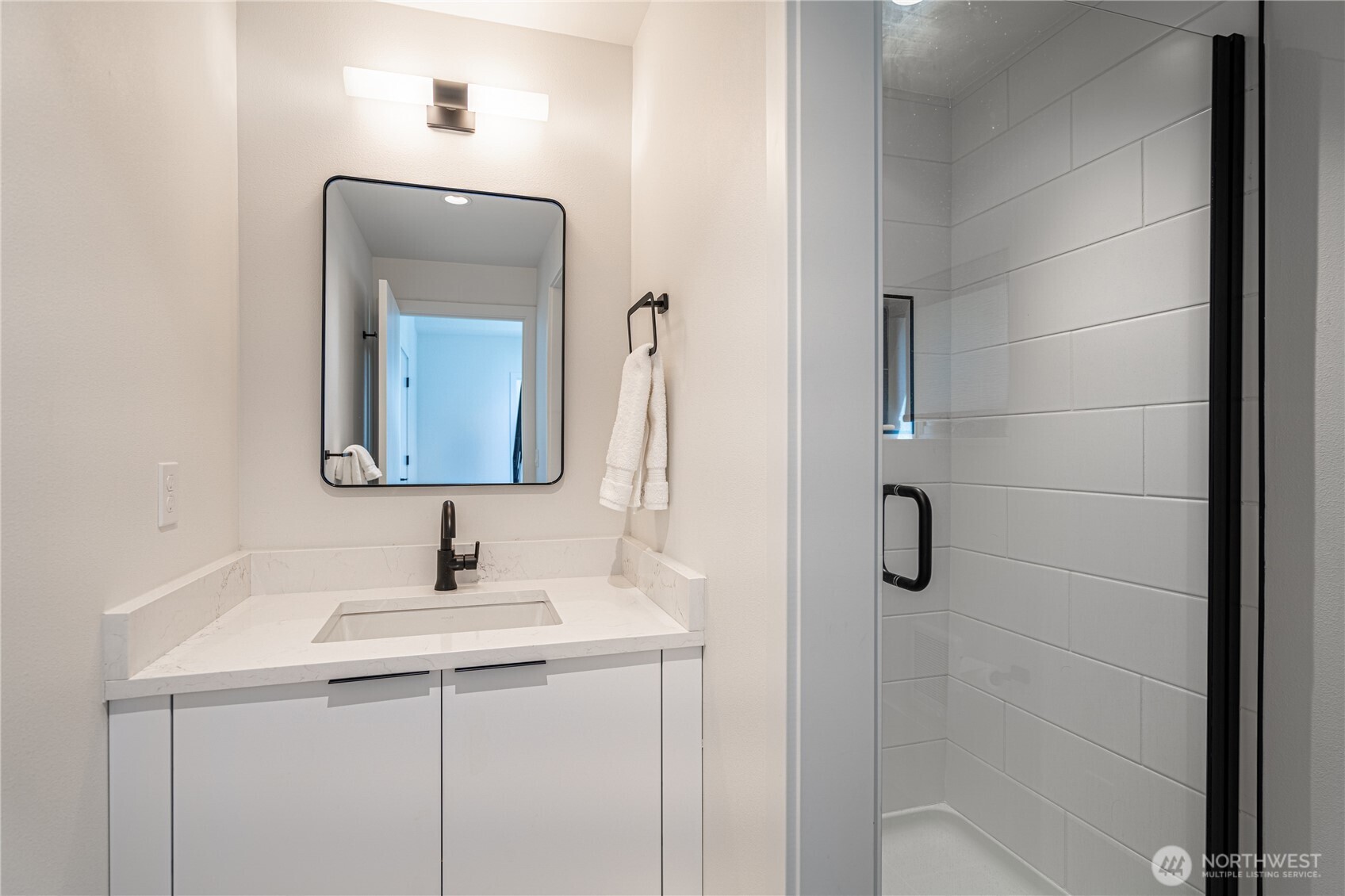 1418 Cottage Lane Chelan, WA 98816 - Photo 25 of 40 a bathroom with a sink vanity and mirror