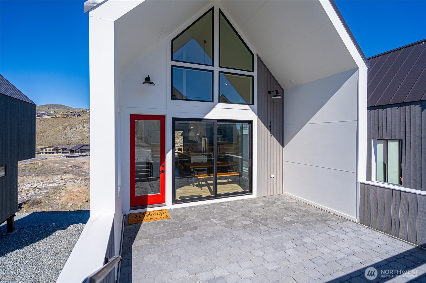 1418 Cottage Lane Chelan, WA 98816 - Photo 4 of 40 a view of an entryway with a house