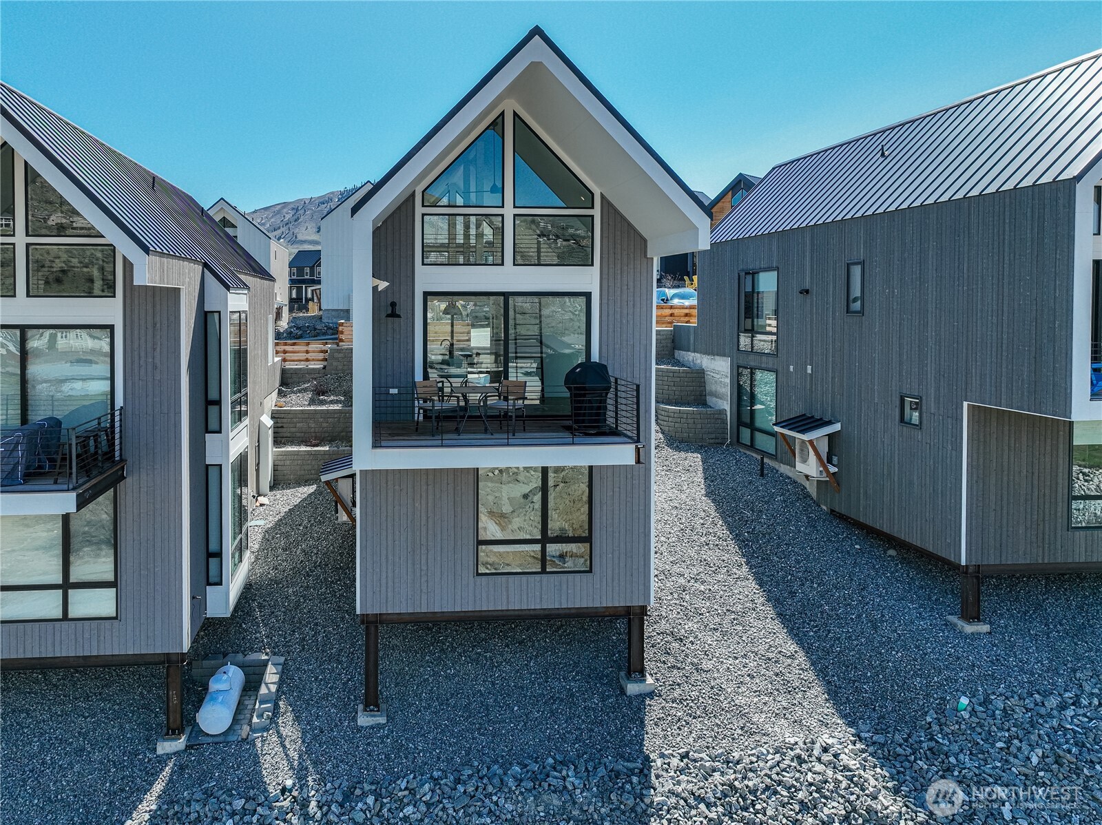 1418 Cottage Lane Chelan, WA 98816 - Photo 5 of 40 a view of a house with a yard