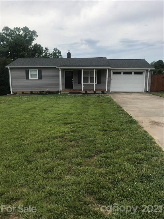 1410 Hopewell Road Morganton, NC 28655 - Photo 1 of 1 a view of a house with a backyard