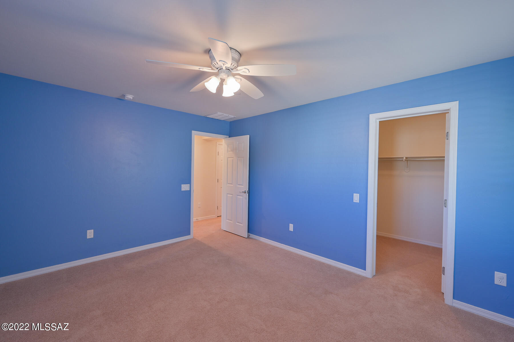 10804 East Salsabila Road Tucson, AZ 85747 - Photo 38 of 50 a view of an empty room with a fan