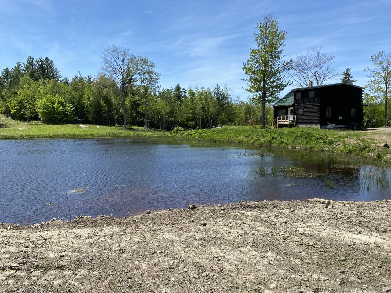 1015 Colby Road Palermo, ME 04354 - Photo 9 of 35 Cabin from the pond
