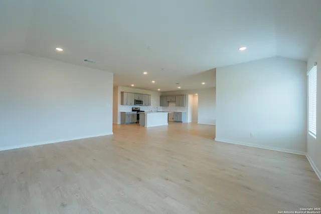 a view of kitchen and a window