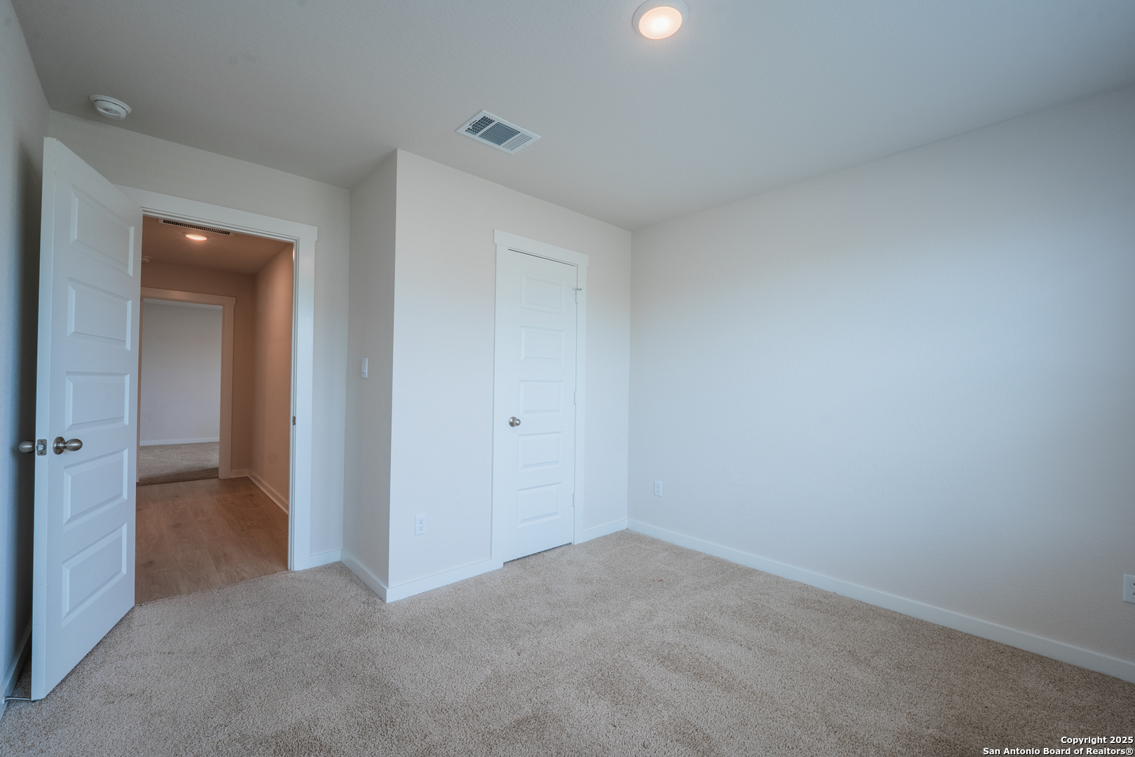 125 Nicks Cove Lockhart, TX 78644 - Photo 29 of 40 a view of an empty room and closet area