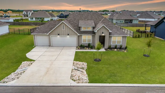 a view of house with garden